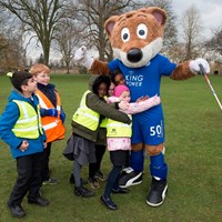 Litter Campaign 2018 - Photo 3 Children hugging Filbert Fox mascot