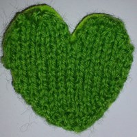 Image of a green stitched heart