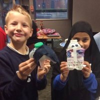 Children showcasing their eco designs