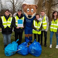 Litter Campaign 2018 - Photo 1 Litter Less volunteers stood with Filbert Fox mascot and bags of litter