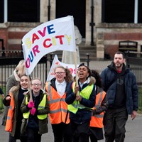 Litter Less Campaign 2018 12 Children marching with a "Save Our City" banner