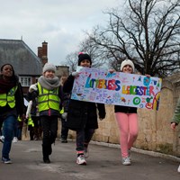 Litter Less Campaign 2018 21 Children marching with a "Litterless Leicester" banner
