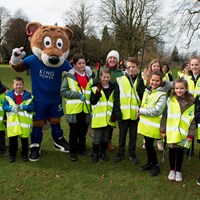 Litter Less Campaign 2018 22 Group of children in high-vis vests stood with Filbert Fox mascot