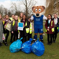 Litter Less Campaign 2018 33 Young volunteers stood by collected rubbish with Filbert Fox mascot giving a thumbs up