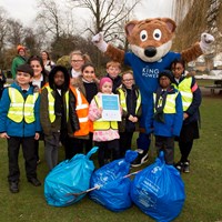 Litter Less Campaign 2018 34 Filbert Fox mascot celebrating near collected rubbish with children