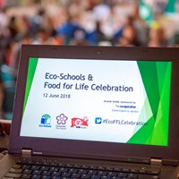 Eco-Schools celebration 14 Laptop screen with the words "Eco-Schools & Food for Life Celebration - 12 June 2018"