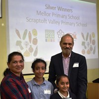 Grow Your Own Grub 2018 - 2 Cllr Piara Singh Clair presenting Silver award to representatives from Mellor Primary School