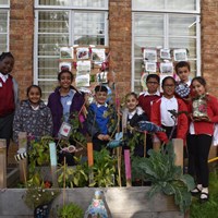 Grow Your Own Grub 2018 - 8 Children from Mayflower Primary School in their vegetable garden