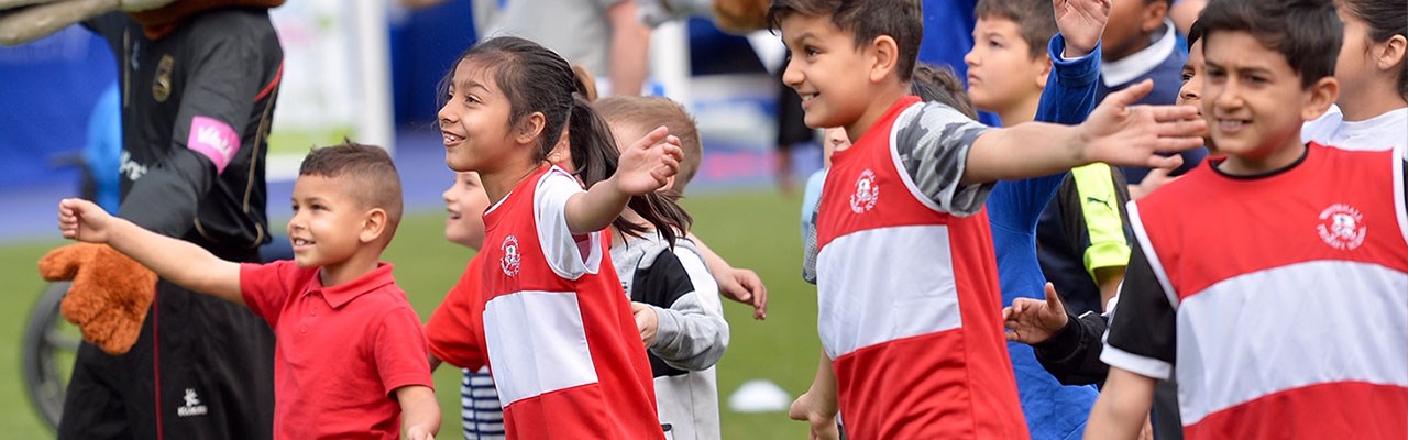 School children exercising at the daily mile celebration event
