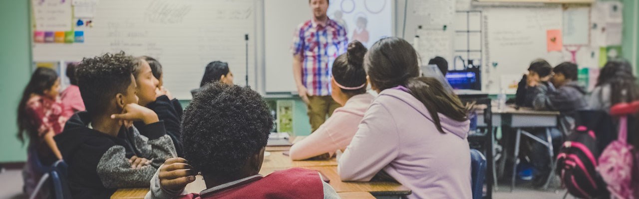 School children in lesson with their teacher