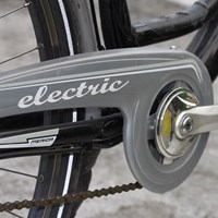 close up of a bike pedal with the word electric printed on the metal